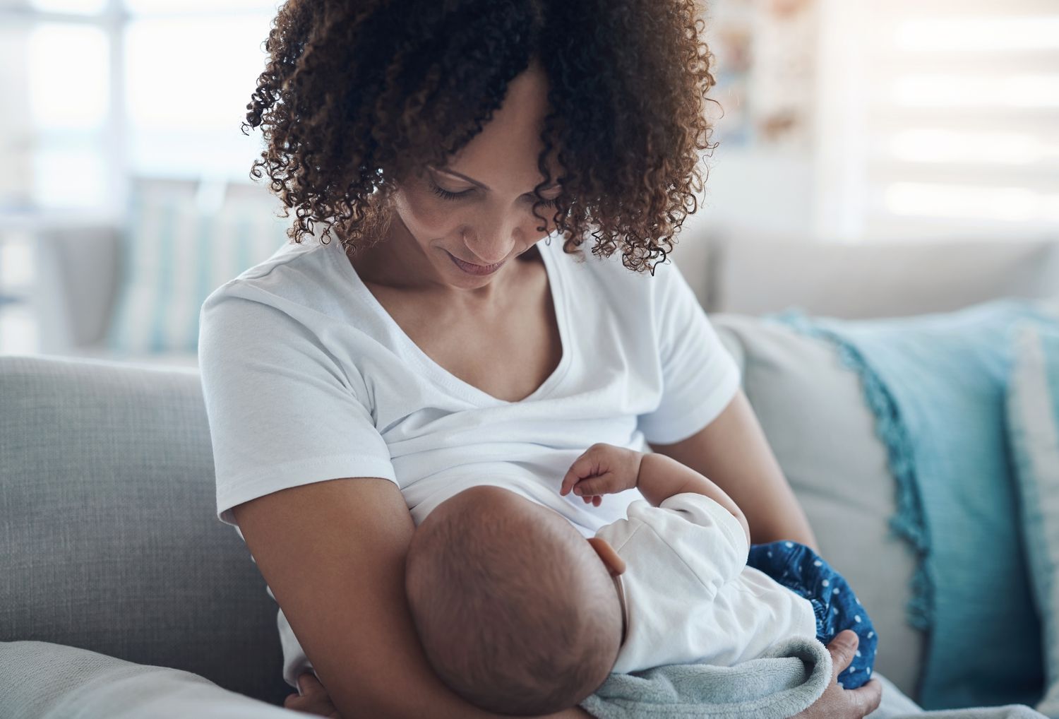 Parent breastfeeding their infant