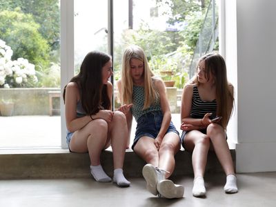 Teen girls talking together