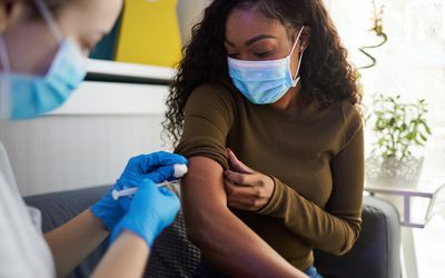 person getting vaccinated