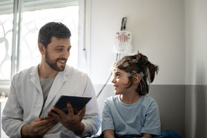 Doctor talking to a boy before polysomnography (sleep study)